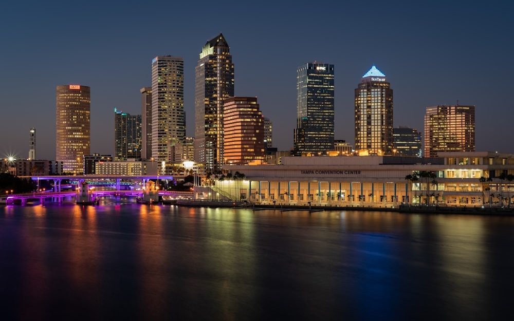 The Tampa skyline over the river at night